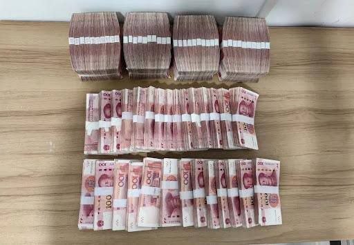 国内新闻 北京警方狂端48个洗钱车队 拦截黄金8公斤现金近3000万